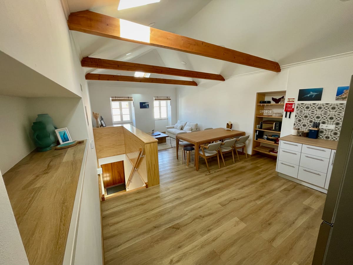 Open living, dining, and kitchen area inside Casa Tarapacana